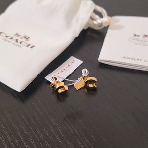 Gold Coach stud earrings